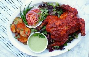Whole Tandoori Chicken with Tandoori Roast Potatoesمرغ تنوری هندی